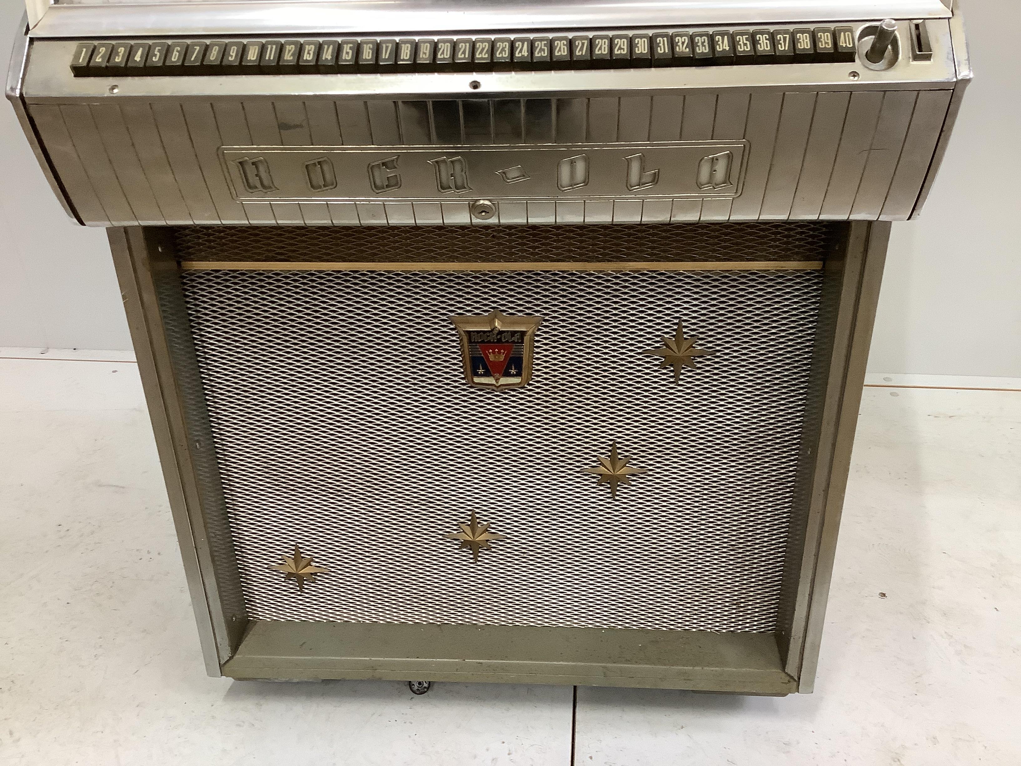 A mid century Rock. Ola 120 hi-fi juke box, amp rebuilt and refurbished, width 77cm, depth 69cm, height 141cm
